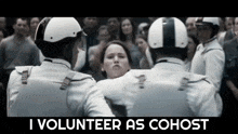a group of police officers holding a woman in a crowd with the words i volunteer as cohost