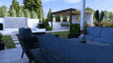 a rendering of a backyard with a blue couch