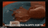 an older woman wearing headphones and a hat is dancing in a room with the words `` made em extra sloppy for ya '' .