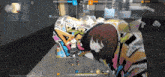 a screenshot of a video game with a girl on the wall