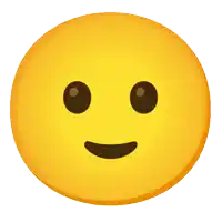 a yellow smiley face with a slight smirk on it 's face