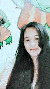 a woman with long black hair wearing a necklace with the letters chanel on it
