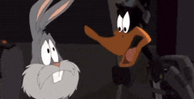 Daffy Duck Looney Tunes GIF - Daffy Duck Looney Tunes Daffy Duck Machine Gun GIFs