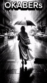 a black and white photo of a woman holding an umbrella with the word okabers on the top