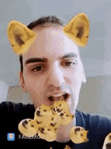 a man is wearing a face mask that looks like a dog with ears