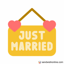a sign that says just married with two red hearts on it