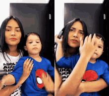 a woman is holding a little boy who is wearing a blue shirt with a spider man on it
