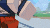 a close up of a cartoon character 's arm with a landscape in the background