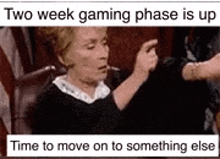 a woman is sitting in a chair talking to another woman .