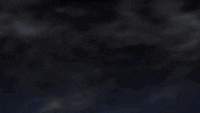 a bunch of swords are glowing in blue flames