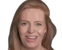 a woman with long red hair is smiling and looking at the camera .