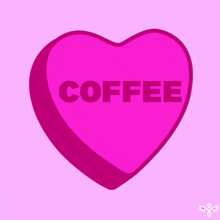 a pink heart shaped candy with the word coffee written on it