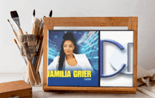 a framed picture of a woman named jamilia grier show