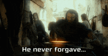 a man hammering a piece of metal with the words he never forgave