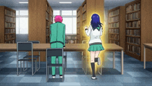 a man and a girl are sitting at a table in a library and the girl is running