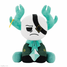 a stuffed animal with antlers and a sad face is sitting on a white background