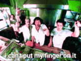 a group of people in a kitchen with the words i can 't put my finger on it below them