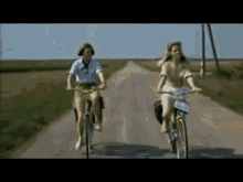 Women Riding Bycicles At Noon GIF - Women Riding Bycicles At Noon GIFs
