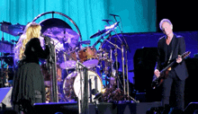 Stevie Nicks Lindsey Buckingham GIF - Stevie Nicks Lindsey Buckingham Concert GIFs
