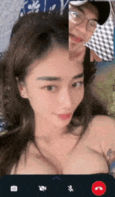 a man and a woman are having a video call and the woman is naked
