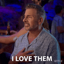 a man in a blue shirt says i love them netflix