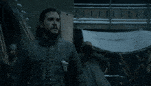 a man says hello there in front of a group of people