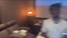 a blurry picture of a person in a room