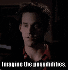 a man in a dark room with the words imagine the possibilities below him