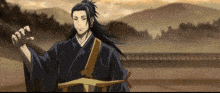 a man in a kimono is waving his hand