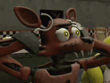 a close up of a cartoon character with yellow eyes and teeth