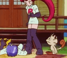 a cartoon of a woman standing next to a cat .