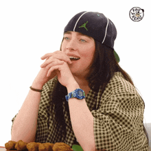 a woman wearing a hat that says air jordan is laughing