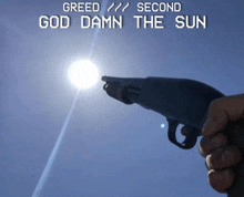 greed second god damn the sun is written on a blue background