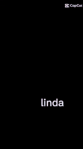 a blurry picture of a woman with the name linda on the bottom right