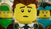 a close up of a lego figure with a surprised expression