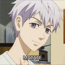 a close up of a person 's face with the word matate on the bottom right