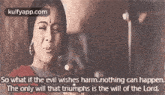 a woman is crying in front of a microphone with a quote .