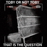 a black and white photo of a chair with the words `` toby or not toby that is the question ''
