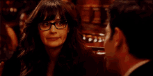 When You Catch Your Friend Looking At You… GIF - New Girl Zooey Deschanel Quirky Smile GIFs