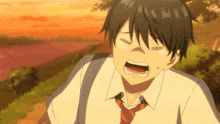 a boy in a white shirt and red tie is crying with his mouth open