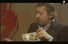 Serge Gainsbourg GIF - Burn Money GIFs