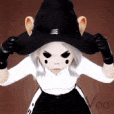 a girl wearing a black witch hat and gloves with the word voo on the bottom right