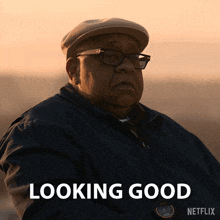 a man with glasses and a hat is looking good on a netflix poster