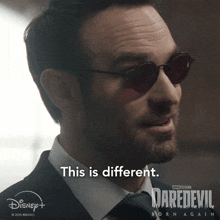 a man in a suit and tie says this is different