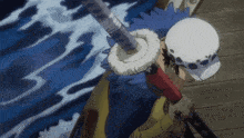 a man is holding a sword in front of a body of water in a cartoon .