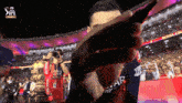 a man taking a selfie in a stadium with the word ipl on the bottom