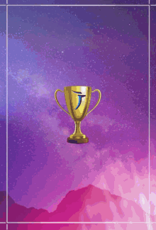 a gold trophy with the letter t on it