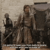 a man with a sword says i 'm going to open you from balls to brains and see what you re made of