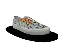 a pair of vans shoes with a tie dye pattern on them