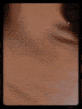 a close up of a person 's face with the name anton on the bottom right